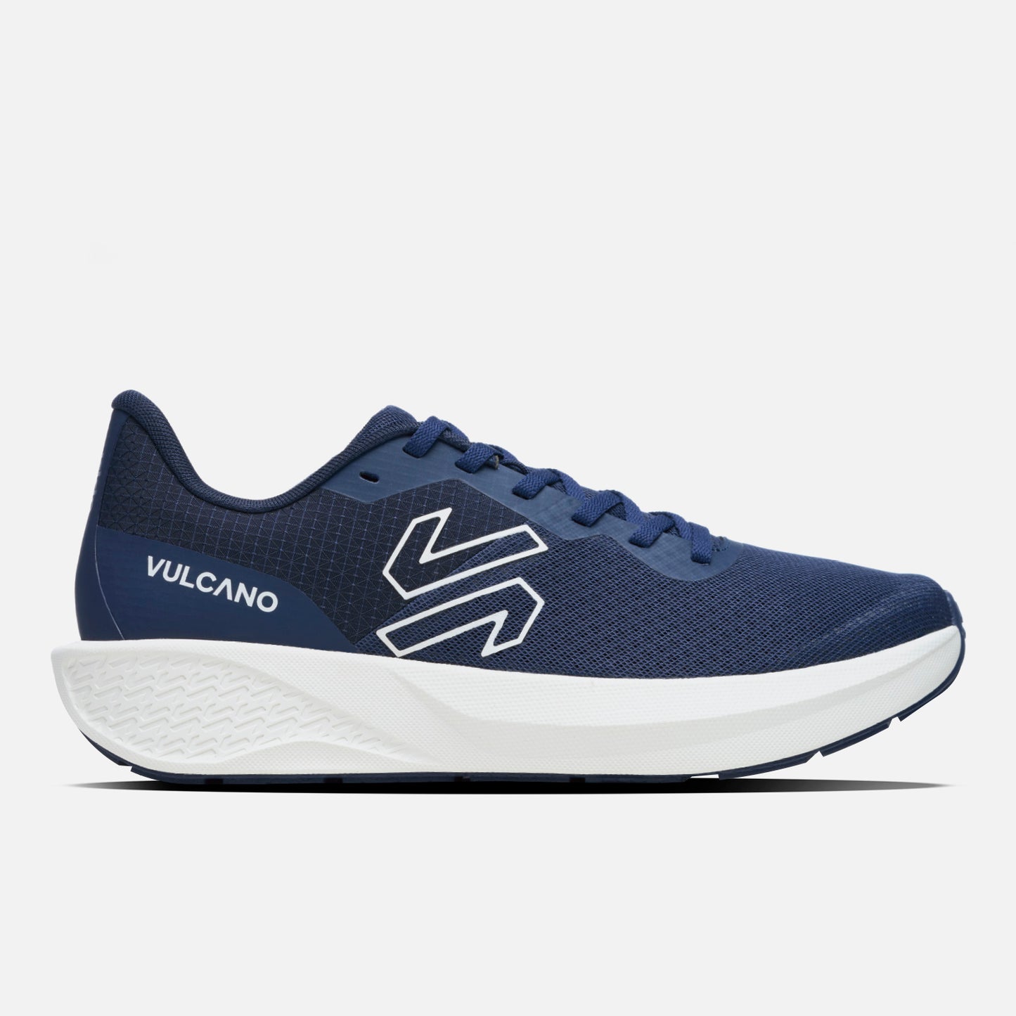 Zapatillas Hombre Ignite Azul Marino Vulcano con diseño deportivo, logo Vulcano y suela blanca ergonómica ideal para running diario.