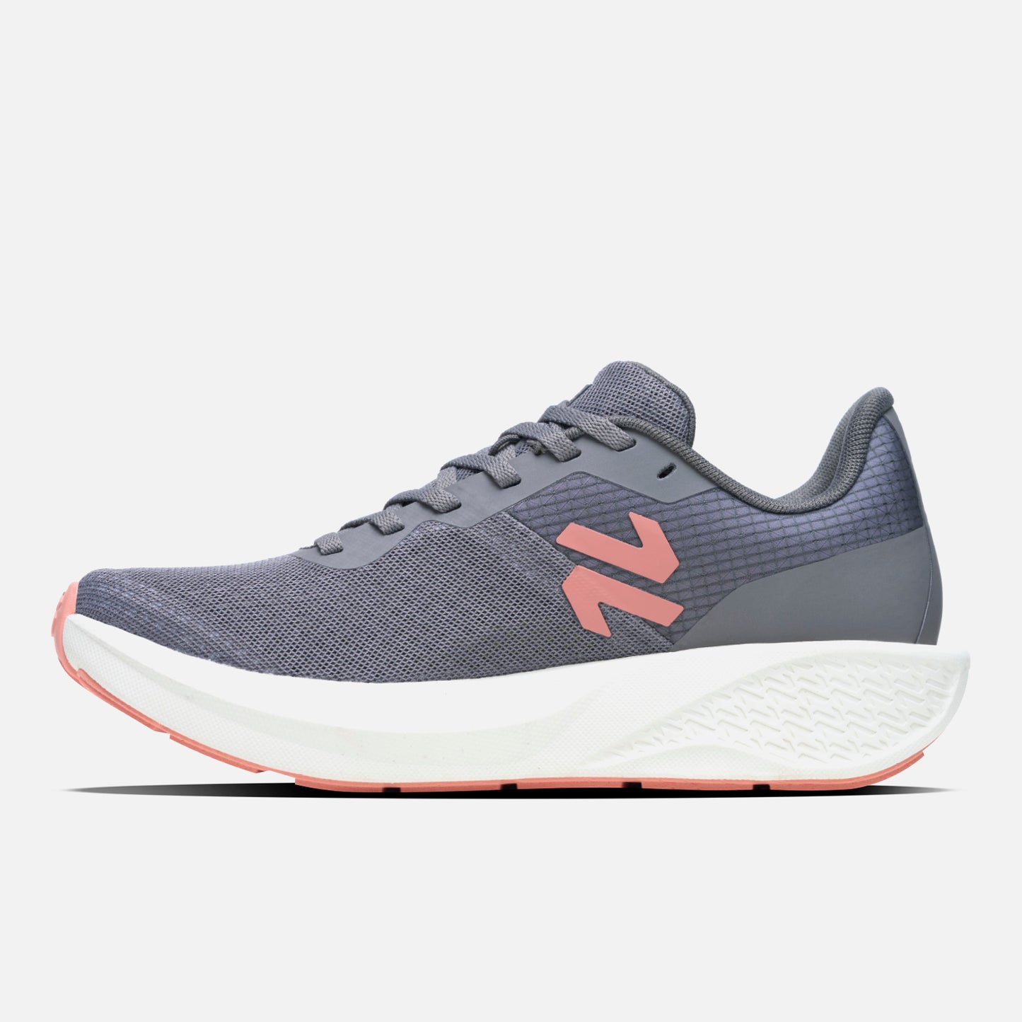 Zapatillas Mujer Ignite Gris Vulcano con diseño ergonómico, upper de micromalla respirable y suela con tecnología Ortholite para running diario.