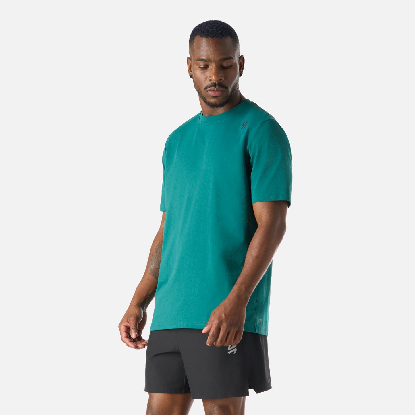 Polera deportiva masculina Tempo T-Shirt Petroleo Vulcano en color petróleo, confeccionada en poliéster con sensación de algodón y secado rápido.