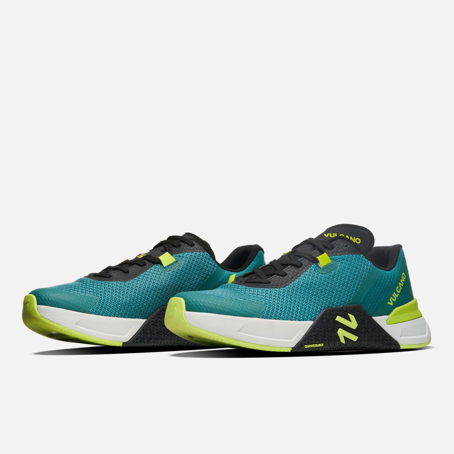 Par de Zapatillas Hombre No Gravity Petroleo Vulcano en ángulo tres cuartos, mostrando diseño ergonómico y materiales de alto rendimiento.