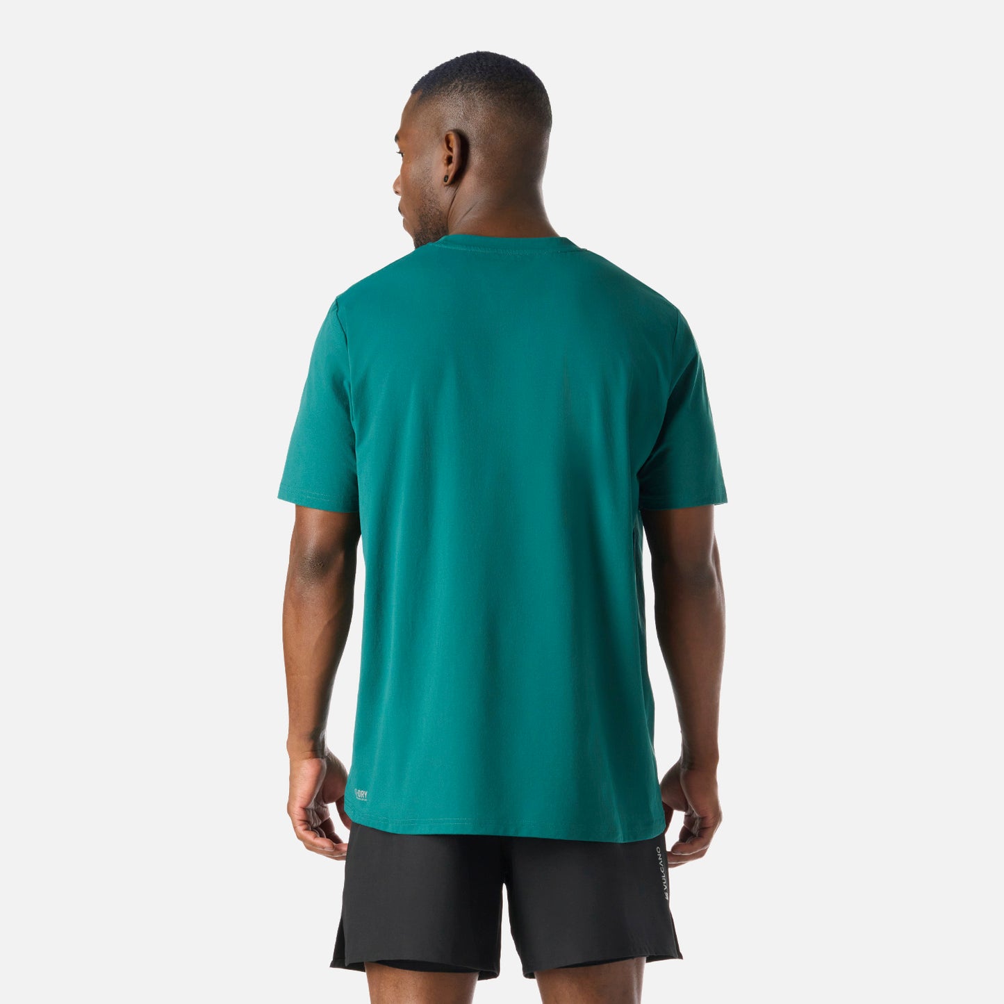 Vista trasera de la Polera Hombre Tempo T-Shirt Petroleo Vulcano mostrando su corte recto y diseño funcional para actividades físicas.