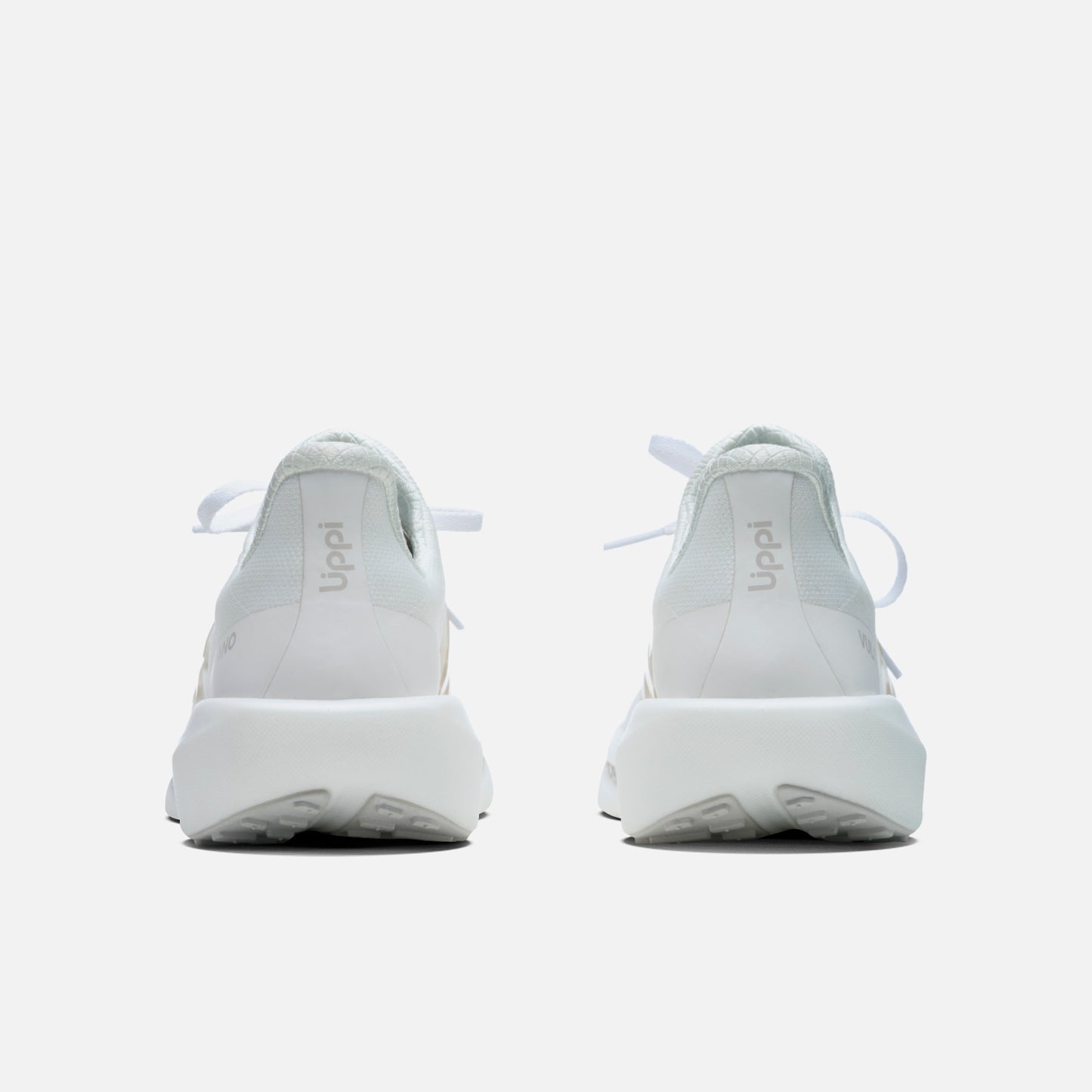 Vista trasera de las Zapatillas Mujer Magma Blanco Vulcano con talón reforzado y logo Uppi, pensadas para confort y durabilidad.