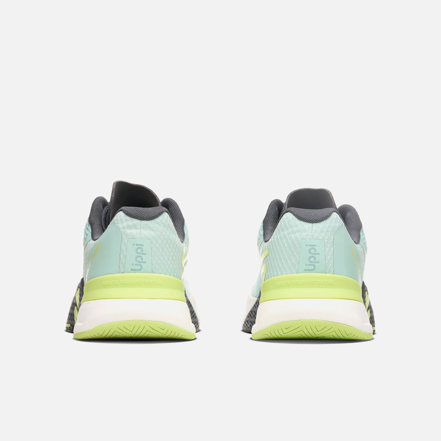 Vista trasera de las Zapatillas Mujer No Gravity Jade Vulcano en color jade con detalles en negro y suela verde lima, ideales para training y pesas.