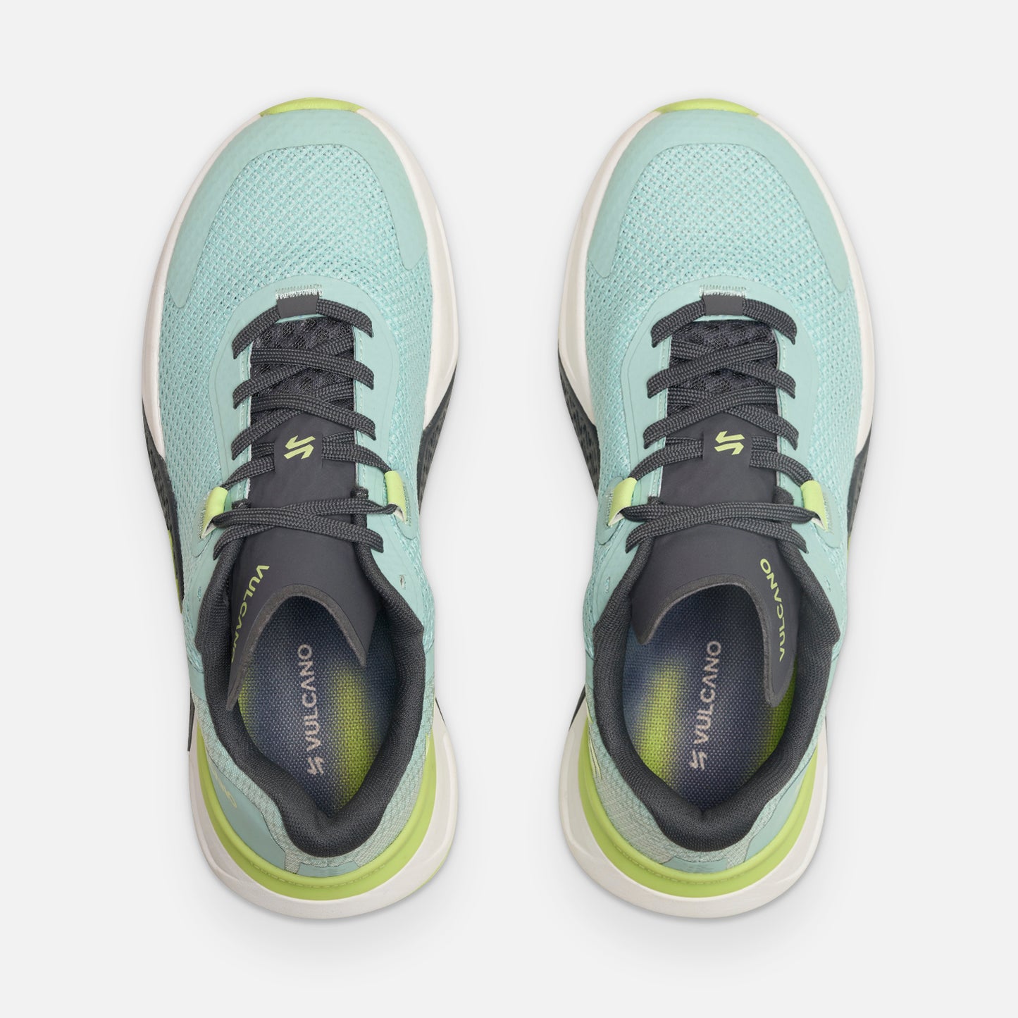 Zapatillas Mujer No Gravity Jade Vulcano en vista superior, diseño ergonómico con malla transpirable y detalles en verde lima para entrenamiento intenso.