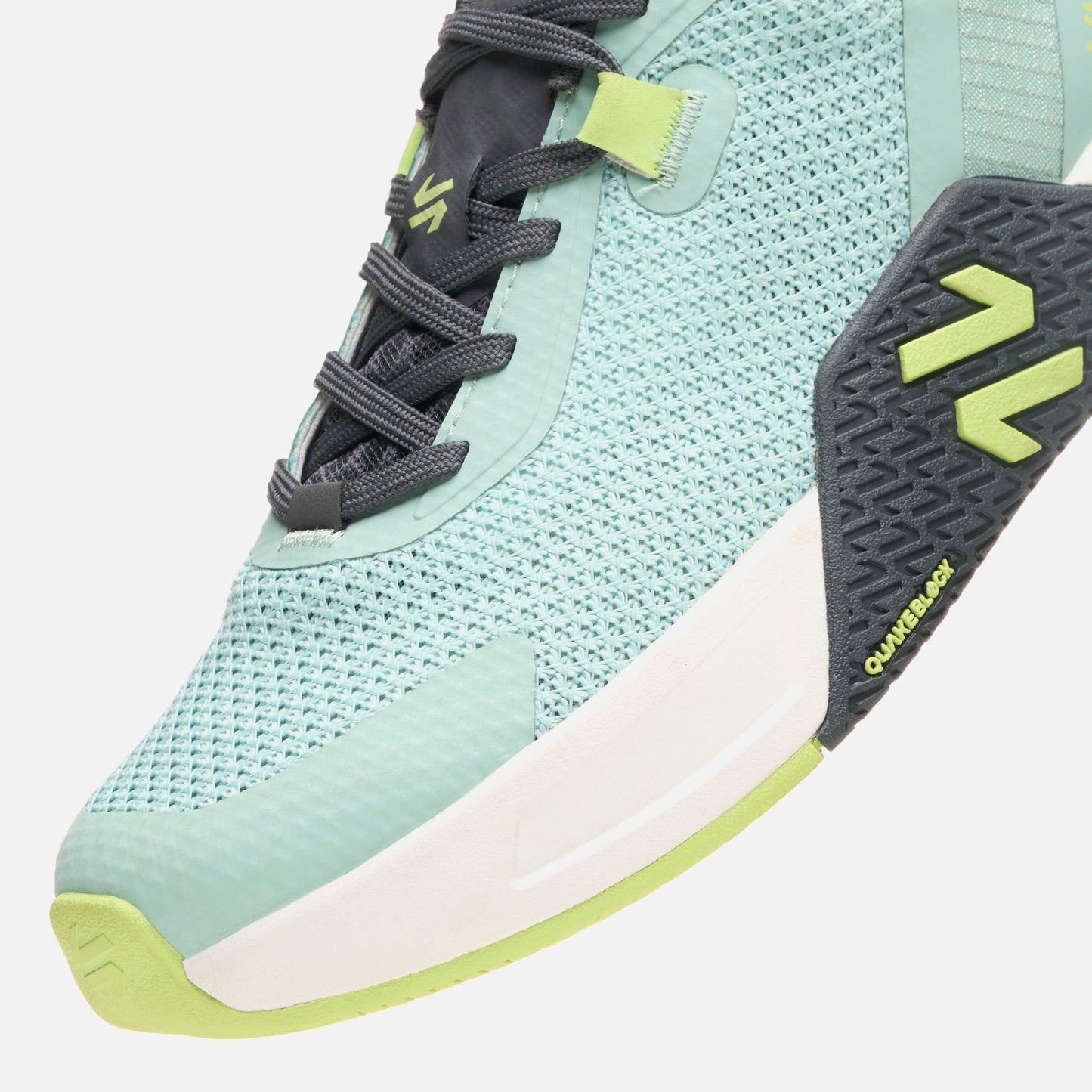 Zapatillas Mujer No Gravity Jade Vulcano en color verde jade con detalles en negro y suela blanca, diseñadas para entrenamiento con tecnología QuakeBlock.