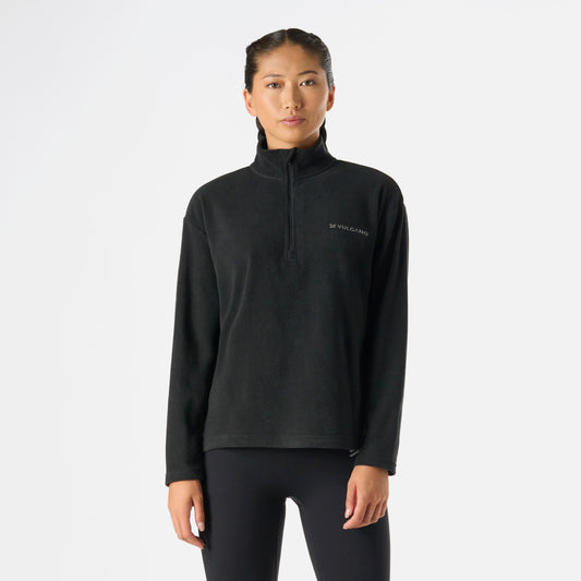 Polerón Mujer Cool Down 1/4 Zip Fleece Negro Vulcano con cierre frontal parcial, ideal para invierno y estilo lifestyle. Diseño cómodo y versátil.