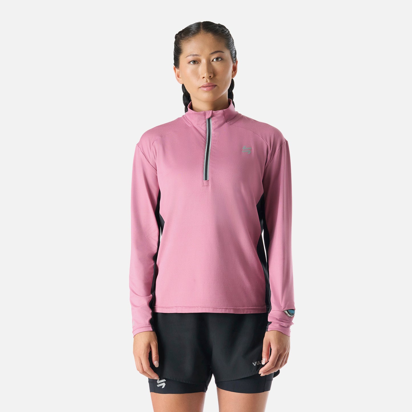 Polerón Mujer Tempo 1/4 Zip Midlayer Rosado Vulcano con cierre frontal y tecnología Q-Dry, ideal para running y entrenamiento en invierno.