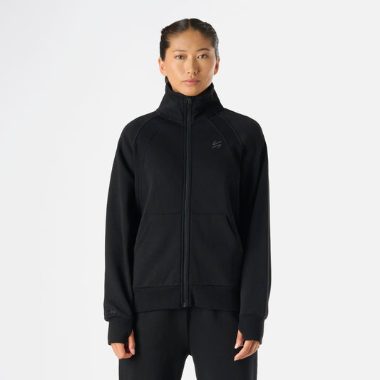 Polerón Mujer Cool Down Full Zip Sweatshirt Negro Vulcano con cierre completo, cuello alto y bolsillos frontales, ideal para invierno y estilo lifestyle.